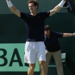 
              Britain's Andy Murray celebrates beating France's Gilles Simon, taking Britain to the semifinal stage, during the quarterfinal tennis matches of the Davis Cup at the Queen's Club in London, Sunday July 19, 2015. (AP Photo/Tim Ireland)
            