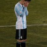 
              Argentina's Lionel Messi gestures in a penalty kick shoot-out with Chile during the Copa America final soccer match at the National Stadium in Santiago, Chile, Saturday, July 4, 2015. (AP Photo/Silvia Izquierdo)
            