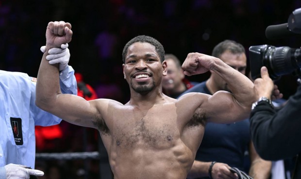 Shawn Porter reacts after being declared the winner by unanimous decision against Adrien Broner aft...
