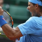 
              Spain's Rafael Nadal clenches his fist after scoring a point in his fourth round match of the French Open tennis tournament against Jack Sock of the U.S. at the Roland Garros stadium, in Paris, France, Monday, June 1, 2015. Nadal won in four sets, 6-3, 6-1, 5-7, 6-2. (AP Photo/Thibault Camus)
            
