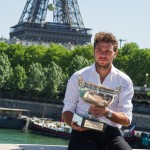 
              French Open Men's Singles champion Stan Wawrinka of Switzerland poses for a photo with his trophy in front of the Eiffel tower in Paris, France, Monday, June 8, 2015.  Wawrinka defeated Serbia's Novak Djokovic  in four sets, 4-6, 6-4, 6-3, 6-4, in the men's final of the French Open tennis tournament, at Roland Garros stadium in Paris. (AP Photo/Kamil Zihnioglu)
            