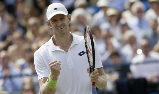 South Africa’s Kevin Anderson celebrates beating Spain’s Guillermo Garcia-Lopez in thei...