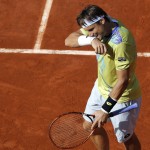 
              Spain's David Ferrer wipes his face as he plays Britain's Andy Murray during their quarterfinal match of the French Open tennis tournament, at the Roland Garros stadium, Wednesday, June 3, 2015 in Paris.  (AP Photo/Francois Mori)
            