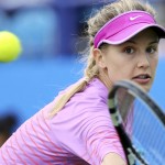 
              Canada's Eugenie Bouchard returns the ball to Alison Riske of the US during day four of the women's International tennis at Devonshire Park, Eastbourne, England, Tuesday June 23, 2015. (Gareth Fuller/PA via AP) UNITED KINGDOM OUT  NO SALES   NO ARCHIVE
            
