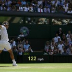 
              Roger Federer of Switzerland returns a shot to Sam Groth of Australia during their singles match at the All England Lawn Tennis Championships in Wimbledon, London, Saturday July 4, 2015. (AP Photo/Tim Ireland)
            