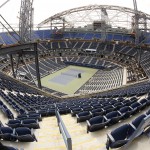 
              Construction on a roof over Arthur Ashe Stadium continues, Friday, May 1, 2015, at the USTA Billie Jean King Tennis Center in New York. While Wimbledon and the Australian Open already put retractable roofs over their main stadiums, players and fans at the U.S. Open won’t be able to enjoy the final result until the 2016 tournament. (AP Photo/Julie Jacobson)
            