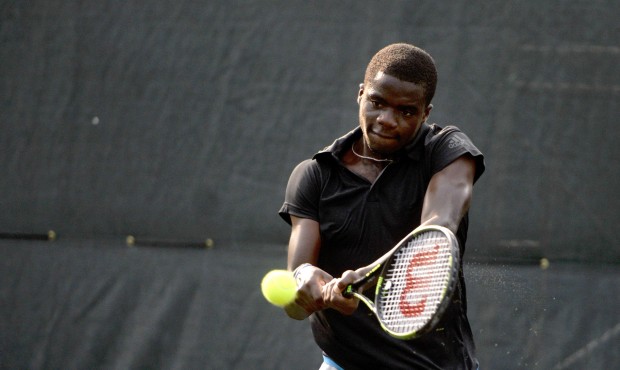 FILE – In this April 25, 2015, file photo, Frances Tiafoe, of the United States, returns a se...