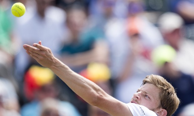David Goffin of Belgium serves in the men’s final match against Nicolas Mahut of France at th...