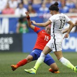 
              United States defender Ali Krieger, right, competes for the ball South Korea midfielder Cho Sohyun during the first half of an international friendly soccer match, Saturday, May 30, 2015, in Harrison, N.J. (AP Photo/Julio Cortez)
            