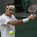
              Roger Federer of Switzerland plays a return to Gilles Simon of France during the men's quarterfinal singles match at the All England Lawn Tennis Championships in Wimbledon, London, Wednesday July 8, 2015. (AP Photo/Pavel Golovkin)
            