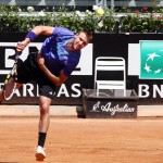 
              Jack Sock from US serves the ball to France's Gilles Simon during their match at the Italian Open tennis tournament, in Rome, Monday, May 11, 2015. (AP Photo/Felice Calabro')
            