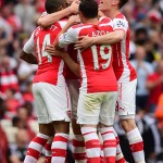 
              Arsenal's Jack Wilshere, hidden, celebrates scoring against West Bromwich Albion with teammates during the English Premier League soccer match at the Emirates Stadium, London, Sunday May 24, 2015. (Dominic Lipinski/PA via AP) UNITED KINGDOM OUT  NO SALES  NO ARCHIVE
            