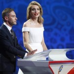 
              Russian model Natalia Vodianova, right, and Russia’s TV presenter Dmitry Shepelev host the preliminary draw for the 2018 soccer World Cup in Konstantin Palace in St. Petersburg, Russia, Saturday, July 25, 2015. (AP Photo/Dmitry Lovetsky
            