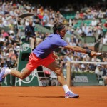 
              Switzerland's Roger Federer returns the ball to France's Gael Monfils during their fourth round match of the French Open tennis tournament at the Roland Garros stadium, Monday, June 1, 2015 in Paris. Federer won 6-3, 4-6, 6-4, 6-1. (AP Photo/Christophe Ena)
            
