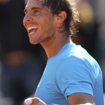 
              Spain's Rafael Nadal celebrates winning his the third round match of the French Open tennis tournament in three sets 6-1, 6-3, 6-2, against Russia's Andrey Kuznetsov at the Roland Garros stadium, in Paris, France, Saturday, May 30, 2015. (AP Photo/David Vincent)
            