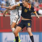 
              Australia's Emily van Egmond, right, and United States' Carli Lloyd go up for the ball during the first half of a FIFA Women's World Cup soccer match in Winnipeg, Manitoba, Monday, June 8, 2015. (John Woods/The Canadian Press via AP) MANDATORY CREDIT
            