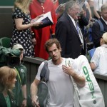 
              Andy Murray of Britain leaves the court after winning the men's quarterfinal singles match Vasek Pospisil of Canada, at the All England Lawn Tennis Championships in Wimbledon, London, Wednesday July 8, 2015. Murray won 6-4, 7-5, 6-4. (AP Photo/Alastair Grant)
            