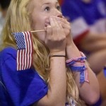 
              Katie Smith, of Madison, Ala., holds her hands on her mouth during a play at Straight To Ale brewery as soccer fans across Huntsville turned out to watch the US Women's Soccer team defeat Japan 5-2 in the Women's World Cup Sunday, July 5, 2015 in Huntsville, Ala.  (Eric Schultz/AL.com via AP)  MANDATORY CREDIT
            
