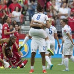 
              England players celebrate a 2-1 win over Canada in a quarterfinal of the Women's World Cup soccer tournament, Saturday, June 27, 2015, in Vancouver, British Columbia, Canada. (Jonathan Hayward/The Canadian Press via AP)
            