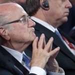 
              FIFA President Sepp Blatter watches the preliminary draw for the 2018 soccer World Cup in Konstantin Palace in St. Petersburg, Russia, Saturday, July 25, 2015. (AP Photo/Ivan Sekretarev
            