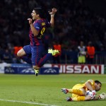 
              Barcelona's Luis Suarez jumps over Juventus goalkeeper Gianluigi Buffon during the Champions League final soccer match between Juventus Turin and FC Barcelona at the Olympic stadium in Berlin Saturday, June 6, 2015. (AP Photo/Michael Probst)
            