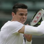 
              Milos Raonic of Canada returns a shot to Tommy Haas of Germany during their singles match at the All England Lawn Tennis Championships in Wimbledon, London, Wednesday July 1, 2015. (AP Photo/Tim Ireland)
            