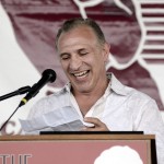 
              International Boxing Hall of Fame inductee, Ray Mancini, laughs while giving his induction speech during the International Boxing Hall of Fame Induction ceremony in Canastota, N.Y., Sunday, June 14, 2015. (AP photos/Heather Ainsworth)
            
