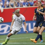 
              United States' Abby Wambach's (20) header goes wide against Australia during the first half of a FIFA Women's World Cup soccer match in Winnipeg, Manitoba, Monday, June 8, 2015. (John Woods/The Canadian Press via AP) MANDATORY CREDIT
            