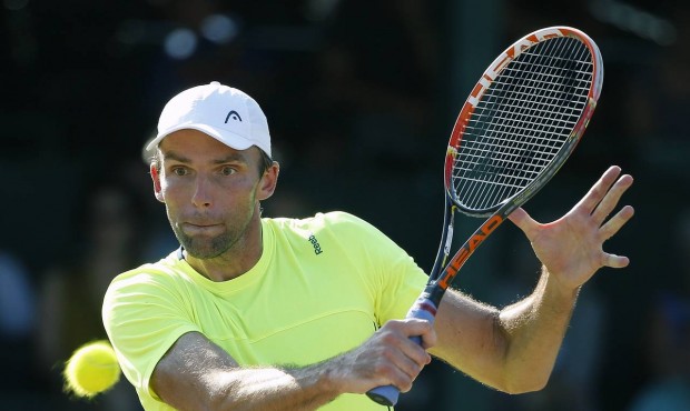 Ivo Karlovic, of Croatia, plays against Jack Sock during a Tennis Hall of Fame Championship semifin...