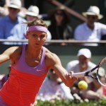 
              Lucie Safarova of the Czech Republic returns in the final of the French Open tennis tournament against Serena Williams of the U.S. at the Roland Garros stadium, in Paris, France, Saturday, June 6, 2015. (AP Photo/Michel Euler)
            