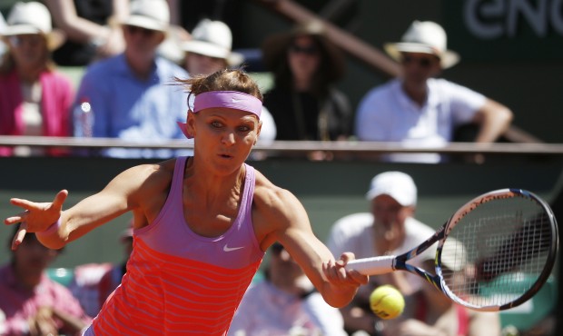 Lucie Safarova of the Czech Republic returns in the final of the French Open tennis tournament agai...