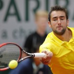 
              Croatia's Marin Cilic returns the ball to Spain's David Ferrer during their fourth round match of the French Open tennis tournament at the Roland Garros stadium, Monday, June 1, 2015 in Paris.  (AP Photo/Christophe Ena)
            