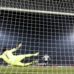 
              Argentina's Gonzalo Higuain shoots a penalty over the crossbar during penalty shootout at the Copa America final soccer match against Chile at the National Stadium in Santiago, Chile, Saturday, July 4, 2015. Goalkeeper Claudio Bravo made a save and striker Alexis Sanchez converted the winning penalty as host Chile defeated Argentina 4-1 in a shootout after a 0-0 draw in the Copa America final on Saturday, finally winning its first major title.(AP Photo/Natacha Pisarenko)
            