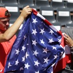 
              Tommy Paul of the U.S., left, holds the American after winning the boys final match of the French Open tennis tournament against Taylor Harry Fritz of the U.S., right, in three sets 7-6, 2-6, 6-2, at the Roland Garros stadium, in Paris, France, Saturday, June 6, 2015. (AP Photo/Thibault Camus)
            