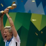 
              United States' Megan Rapinoe hoists the trophy as she celebrates after defeating Japan to win the FIFA Women's World Cup soccer championship in Vancouver, British Columbia, Canada, Sunday, July 5, 2015.   (Darryl Dyck/The Canadian Press via AP) MANDATORY CREDIT
            