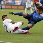 
              United States' DeAndre Yedlin (2) collides with Guatemala midfielder Carlos Mejia (6) in the first half of an international friendly soccer match Friday, July 3, 2015, in Nashville, Tenn. (AP Photo/Mark Humphrey)
            