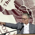 
              International Boxing Hall of Fame inductee, Jim Lampley, points to his wife while giving his induction speech during the International Boxing Hall of Fame Induction ceremony in Canastota, N.Y., Sunday, June 14, 2015. (AP photos/Heather Ainsworth)
            