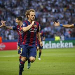 
              Barcelona players celebrate after Ivan Rakitic, centre,  scored his side's first goal during the Champions League final soccer match between Juventus Turin and FC Barcelona at the Olympic stadium in Berlin Saturday, June 6, 2015. (AP Photo/Luca Bruno)
            