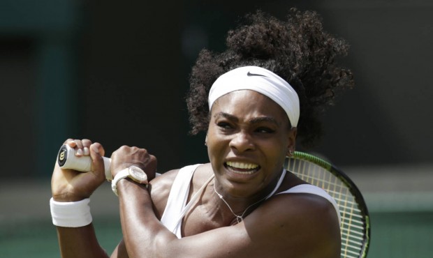Serena Williams of the United States plays a return to Margarita Gasparyan of Russia during their w...