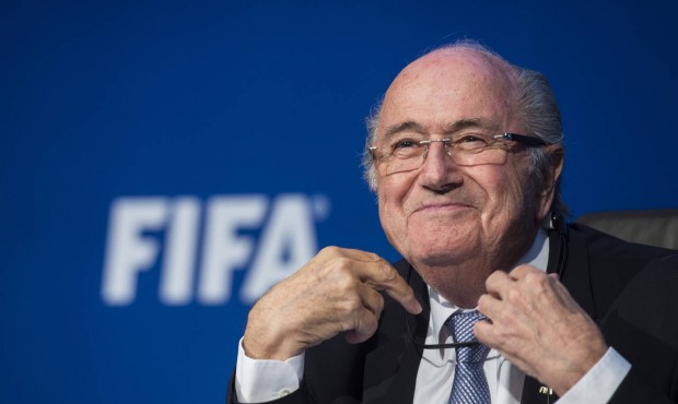 FIFA president Sepp Blatter smiles during a news conference at the FIFA headquarters in Zurich, Swi...