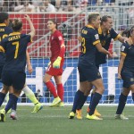 
              Australia's Lisa De Vanna (11) celebrates her goal against the United States during the first half of a FIFA Women's World Cup soccer match in Winnipeg, Manitoba, Monday, June 8, 2015. (John Woods/The Canadian Press via AP) MANDATORY CREDIT
            