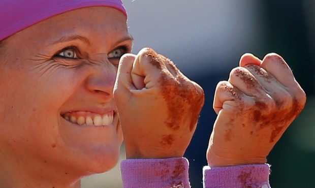 Lucie Safarova of the Czech Republic celebrates winning her semifinal match of the French Open tenn...