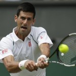 
              Novak Djokovic of Serbia plays a return to Jarkko Nieminen of Finland, during their singles match at the All England Lawn Tennis Championships in Wimbledon, London, Wednesday July 1, 2015. (AP Photo/Alastair Grant)
            