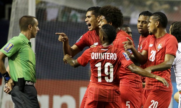 Panama’s Valentin Pimentel, center right, points at referee Mark Geiger, who had given a red ...