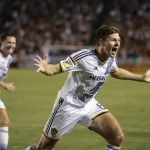 
              Los Angeles Galaxy's Steven Gerrard, of England, celebrates his first goal for the team, during the first half of an MLS soccer match against the San Jose Earthquakes, Friday, July 17, 2015, in Carson, Calif. (AP Photo/Jae C. Hong)
            