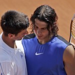 
              In this image taken Wednesday June 7, 2006, Spain's Rafael Nadal, right, shares a word with Serbia's Novak Djokovic at the net after Nadal won a quarter final match during the French Open tennis tournament at the Roland Garros stadium in Paris. Rafael Nadal and Novak Djokovic meet at the net after their 2006 French Open quarterfinal, which Nadal won when Djokovic stopped playing a few points into the third set because of a bad back. That was their first meeting on tour. Their 44th will be Wednesday in the 2015 French Open quarterfinals. (AP Photo/Francois Mori, File)
            