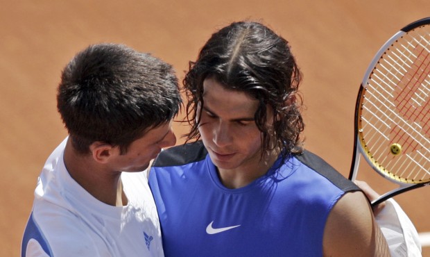 In this image taken Wednesday June 7, 2006, Spain’s Rafael Nadal, right, shares a word with S...