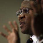 
              South Africa's sports minister Fikile Mbalula gestures as he speaks during a news conference in Johannesburg, South Africa, Wednesday, June 3, 2015.  Mbalula "categorically" denied on Wednesday that the $10 million paid to former FIFA official Jack Warner in 2008 was a bribe for his help in securing the World Cup. (AP Photo/Themba Hadebe)
            