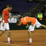 
              Serbia's Nenad Zimonjic, left, and Viktor Troicki check the court during their Davis Cup doubles quarter finals tennis match with Argentina in Buenos Aires, Argentina, Saturday, July 18, 2015. (AP Photo/Daniel Jayo)
            