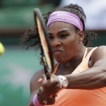 
              Serena Williams of the U.S. returns in the quarterfinal match of the French Open tennis tournament against Italy's Sara Errani at the Roland Garros stadium, in Paris, France, Wednesday, June 3, 2015. (AP Photo/Christophe Ena)
            